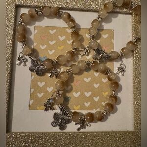 NWOT Stretchy Brown/Cream Beads w/Silver Butterfly & Bow Charms